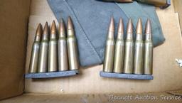 40 rounds 7.62x51 NATO ammunition on stripper clips. Included bandolier denotes 7.62 mm M80.
