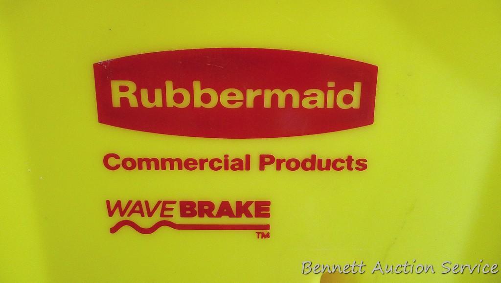 Rubbermaid commercial mop bucket with wringer includes mop and extra NIP mop head. Bucket is 16" x