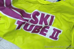 Pull behind Ski Tube II boating tube has hand pump and includes tow rope. Tube is 48" round.