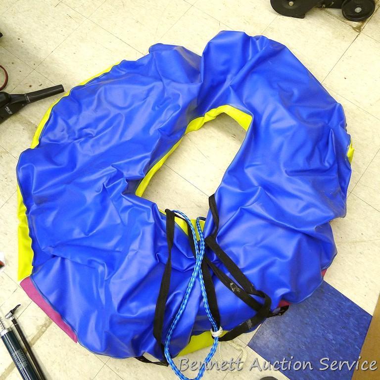 Pull behind Ski Tube II boating tube has hand pump and includes tow rope. Tube is 48" round.
