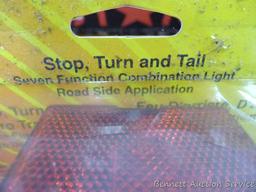 Two stop and turn taillights ( one is NIP), side marker lights, taillight lenses, more.