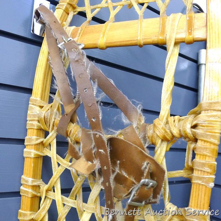 Tubbs 10x6 5-9 snow shoes are 48" long and come with leather bindings and appear in good shape.