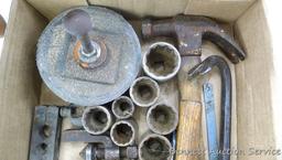 Claw hammer, ball peen hammer, rubber mallet, crow bar, a few 12 point sockets from 3/4" - 1-1/4"