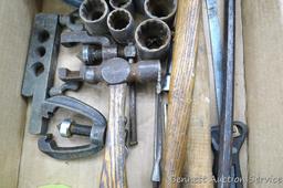 Claw hammer, ball peen hammer, rubber mallet, crow bar, a few 12 point sockets from 3/4" - 1-1/4"