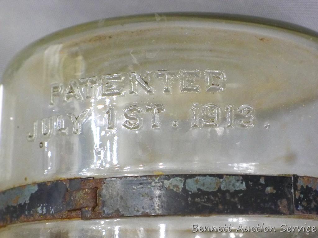 Antique fuel jar or bottle is marked Patented July 1st, 1913 and looks to be in good condition. We