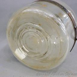 Antique fuel jar or bottle is marked Patented July 1st, 1913 and looks to be in good condition. We