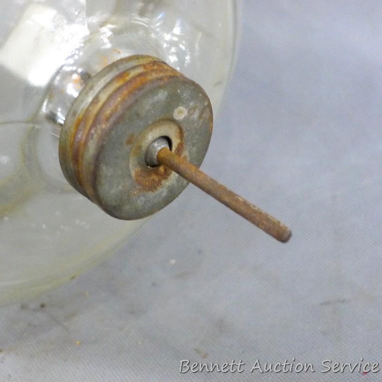 Antique fuel jar or bottle is marked Patented July 1st, 1913 and looks to be in good condition. We