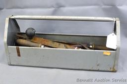 Metal tool caddy holds rasps and files. Box is about 18" x 6" x 8". Minor amount of rust noted.