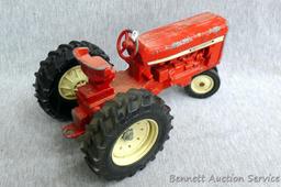 Ertl International tractor with No. 1349 wagon. Tractor with wagon is approx. 18" long.