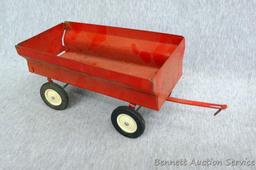 Ertl International tractor with No. 1349 wagon. Tractor with wagon is approx. 18" long.