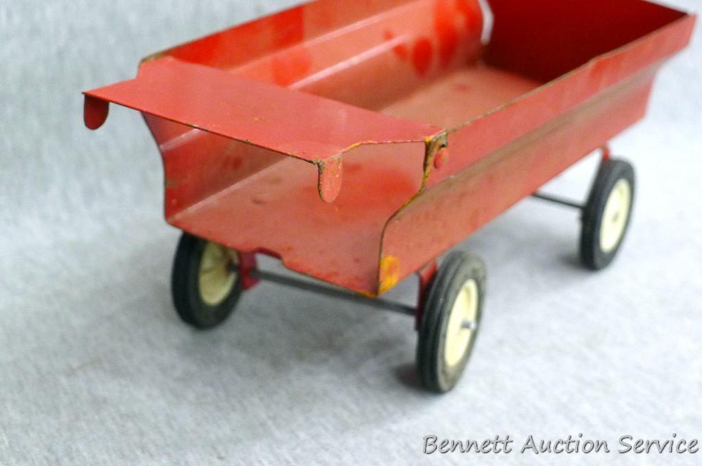 Ertl International tractor with No. 1349 wagon. Tractor with wagon is approx. 18" long.