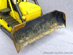 Tonka metal toy bulldozer with rubber tracks is 15" x 7-1/2" x 9-1/2" tall, is missing a headlight