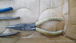 Pair of needle nose, regular, wire cutter pliers, hack saw and more.