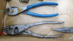 Pair of needle nose, regular, wire cutter pliers, hack saw and more.