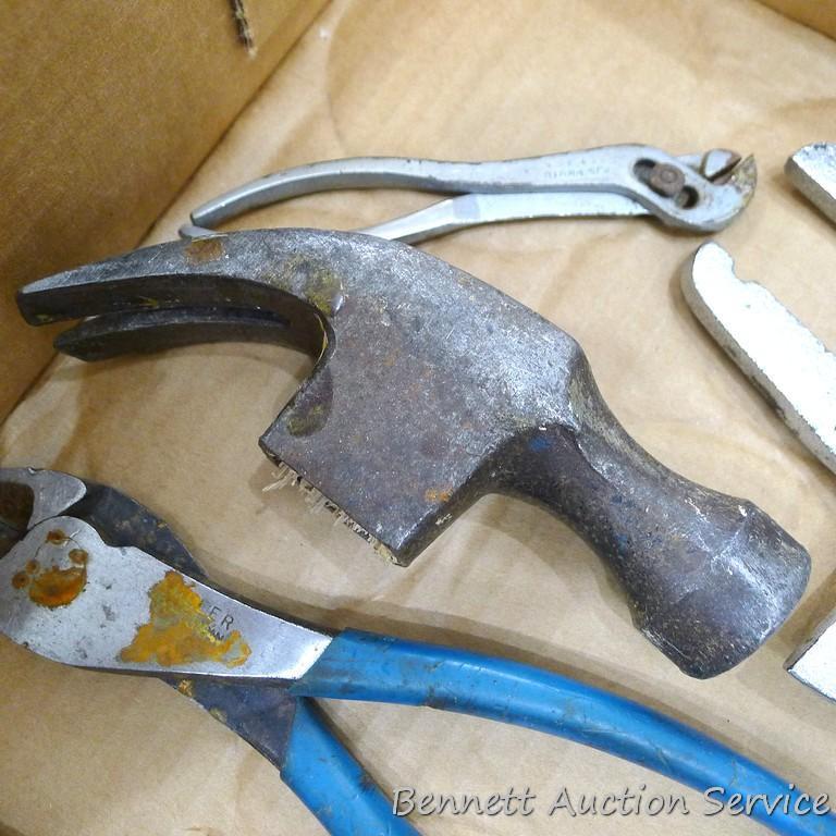 Pair of needle nose, regular, wire cutter pliers, hack saw and more.