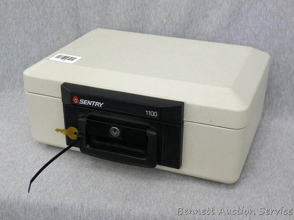 Sentry 1100 fire proof money safe; measures 14" x 10" x 6", looks new and comes with 1 key.