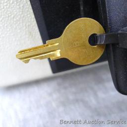 Sentry 1100 fire proof money safe; measures 14" x 10" x 6", looks new and comes with 1 key.