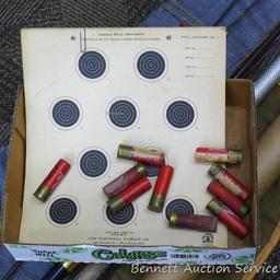 Fishing net and pole sections, 1989 Makita calendar, NRA paper targets, a handful of corroded