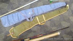 Fishing net and pole sections, 1989 Makita calendar, NRA paper targets, a handful of corroded