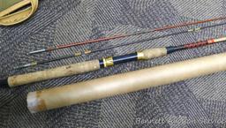 Fishing net and pole sections, 1989 Makita calendar, NRA paper targets, a handful of corroded