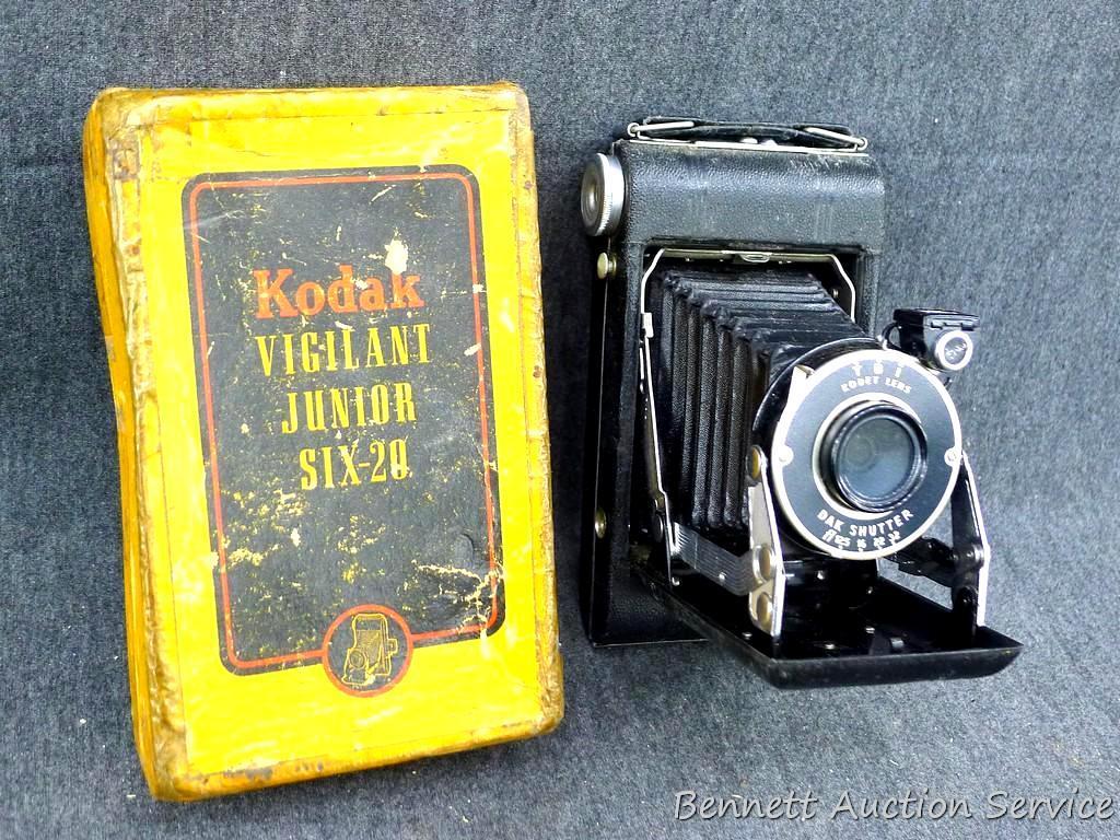 Vintage Kodak Vigilant Junior Six-20 camera is about 6-1/2" x 3-1/2" x 5-1/4" when unfolded. Looks