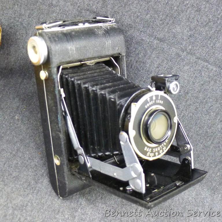 Vintage Kodak Vigilant Junior Six-20 camera is about 6-1/2" x 3-1/2" x 5-1/4" when unfolded. Looks