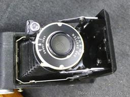 Vintage Kodak Vigilant Junior Six-20 camera is about 6-1/2" x 3-1/2" x 5-1/4" when unfolded. Looks
