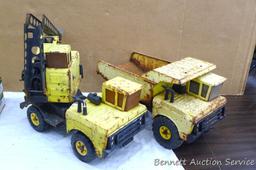 Tonka dump truck, and crane. Dump truck is approx 19" x 8" x 10". Lots of fun in a sandbox or the