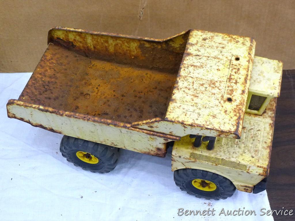Tonka dump truck, and crane. Dump truck is approx 19" x 8" x 10". Lots of fun in a sandbox or the