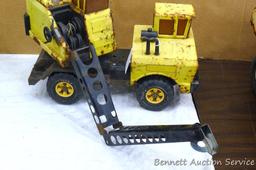 Tonka dump truck, and crane. Dump truck is approx 19" x 8" x 10". Lots of fun in a sandbox or the