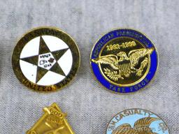 Assorted pins including American Presidential Task Force, NSA, NMA, more.
