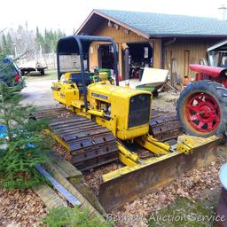Watch the video. John Deere JD 350-B wide track dozer with 9 foot 6-way blade. Tracks are 32" wide.