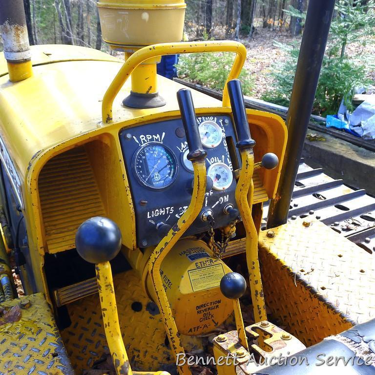 Watch the video. John Deere JD 350-B wide track dozer with 9 foot 6-way blade. Tracks are 32" wide.