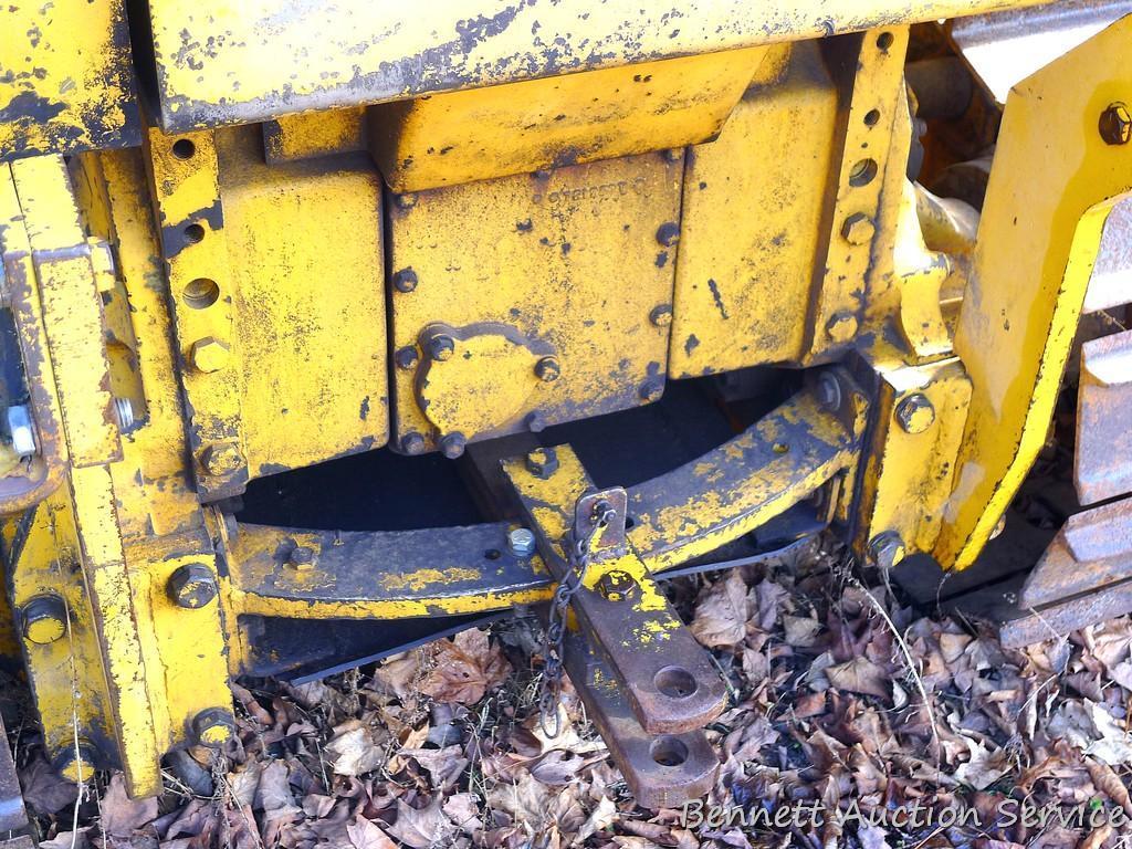 Watch the video. John Deere JD 350-B wide track dozer with 9 foot 6-way blade. Tracks are 32" wide.