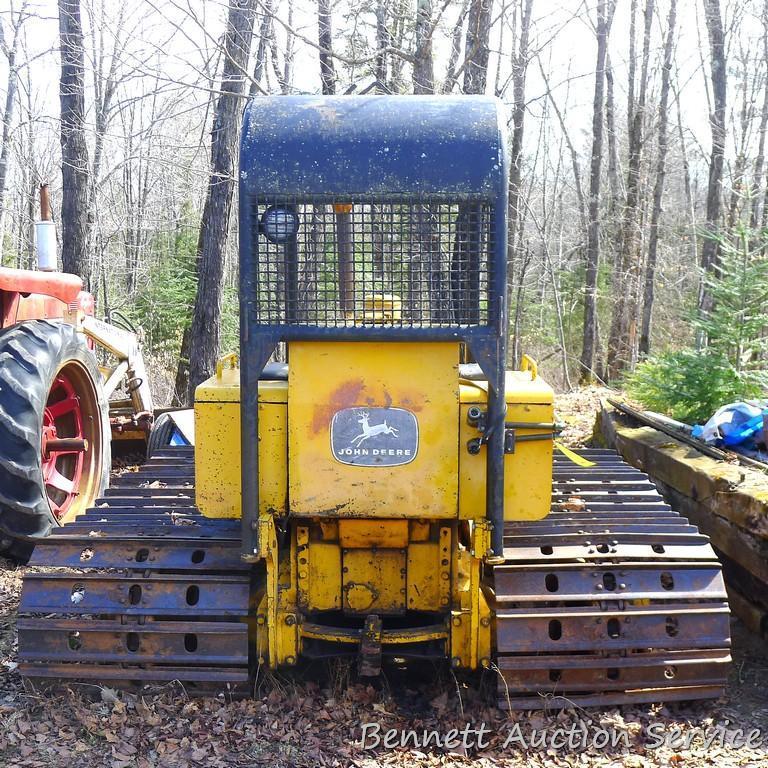 Watch the video. John Deere JD 350-B wide track dozer with 9 foot 6-way blade. Tracks are 32" wide.