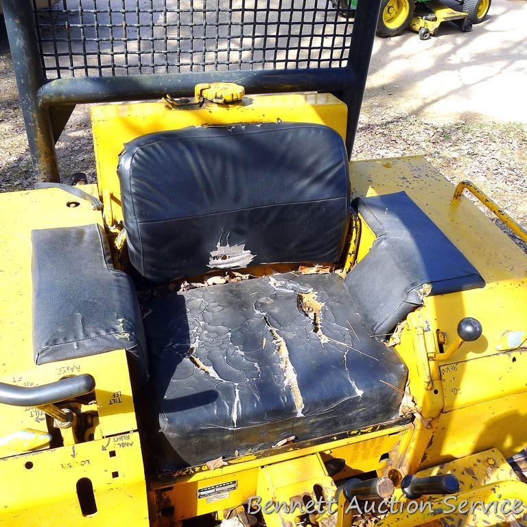 Watch the video. John Deere JD 350-B wide track dozer with 9 foot 6-way blade. Tracks are 32" wide.