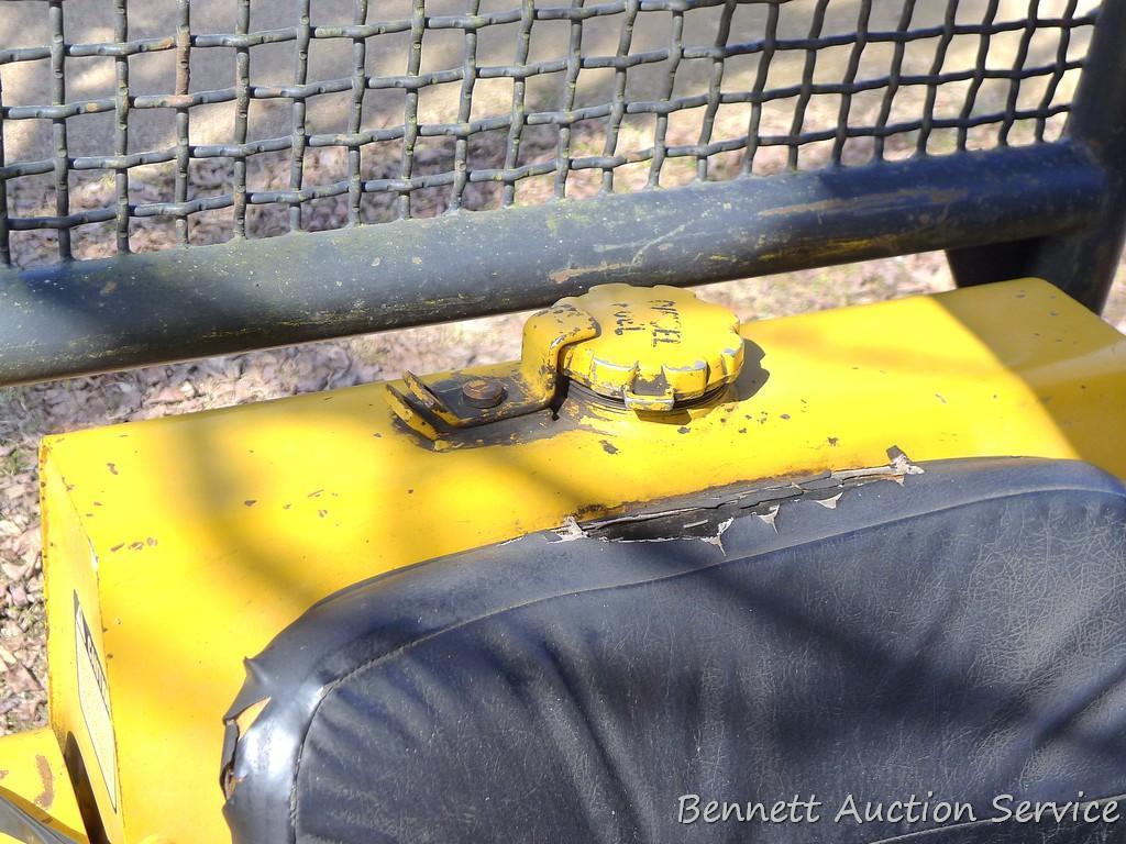 Watch the video. John Deere JD 350-B wide track dozer with 9 foot 6-way blade. Tracks are 32" wide.