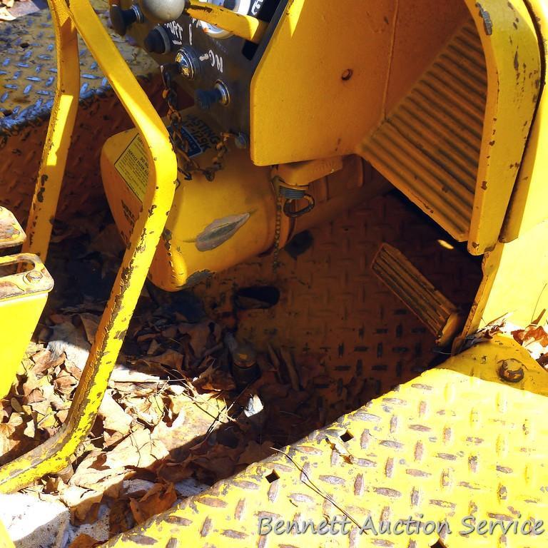 Watch the video. John Deere JD 350-B wide track dozer with 9 foot 6-way blade. Tracks are 32" wide.
