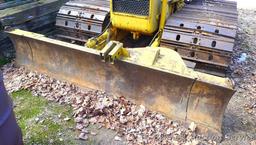 Watch the video. John Deere JD 350-B wide track dozer with 9 foot 6-way blade. Tracks are 32" wide.