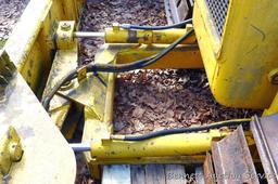 Watch the video. John Deere JD 350-B wide track dozer with 9 foot 6-way blade. Tracks are 32" wide.