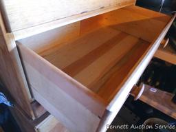 Little four drawer dresser is in good condition. Measures 36" high x 28" wide x 15" deep. Matches