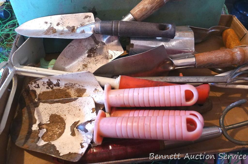 Spring is coming. Quantity of gardening tools including bulb planter.