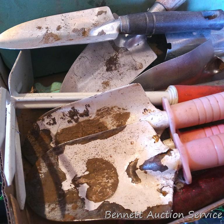 Spring is coming. Quantity of gardening tools including bulb planter.