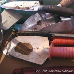 Spring is coming. Quantity of gardening tools including bulb planter.