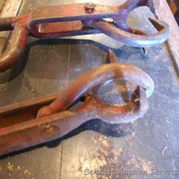 Pair of pulpwood log tongs, each a foot long.
