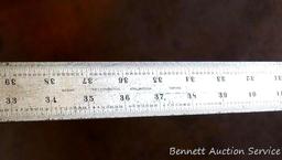 Starrett No. C404R 6' steel rule shows plenty of use, but still looks straight when I eyeball down