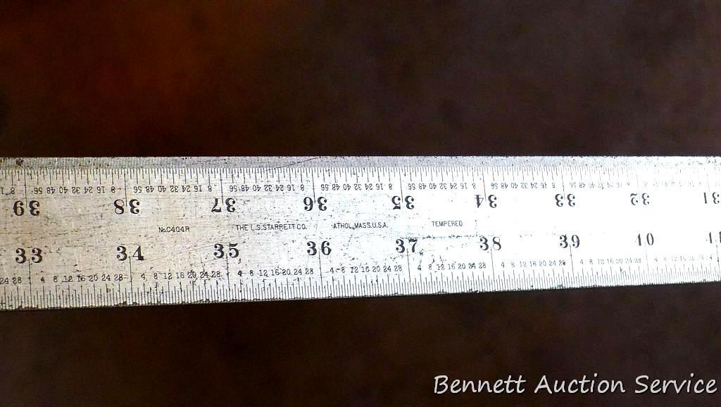 Starrett No. C404R 6' steel rule shows plenty of use, but still looks straight when I eyeball down