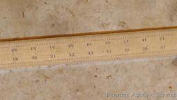 Starrett No. C404R 6' steel rule shows plenty of use, but still looks straight when I eyeball down