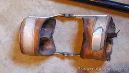 Leather and metal knee braces are old enough to decorate with. 34" cane has a slightly loose handle.