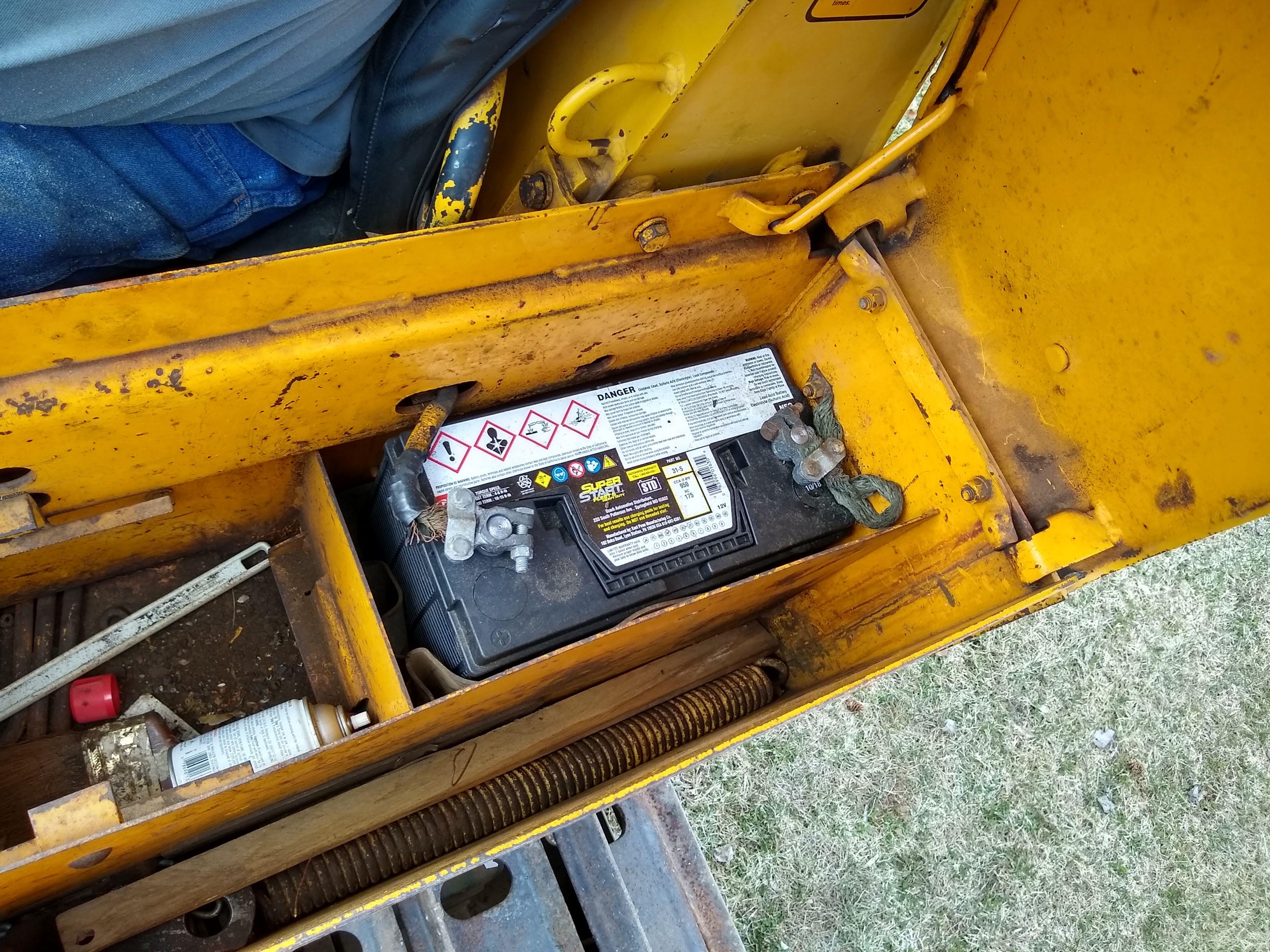 Watch the video. John Deere JD 350-B wide track dozer with 9 foot 6-way blade. Tracks are 32" wide.
